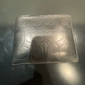 Men’s coach wallet. Used for a few days.